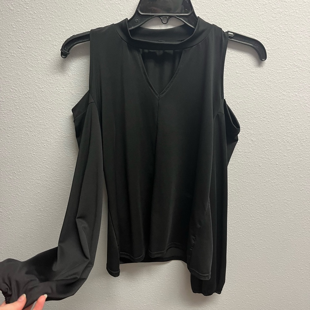 Cute black shirt with shoulder cutouts